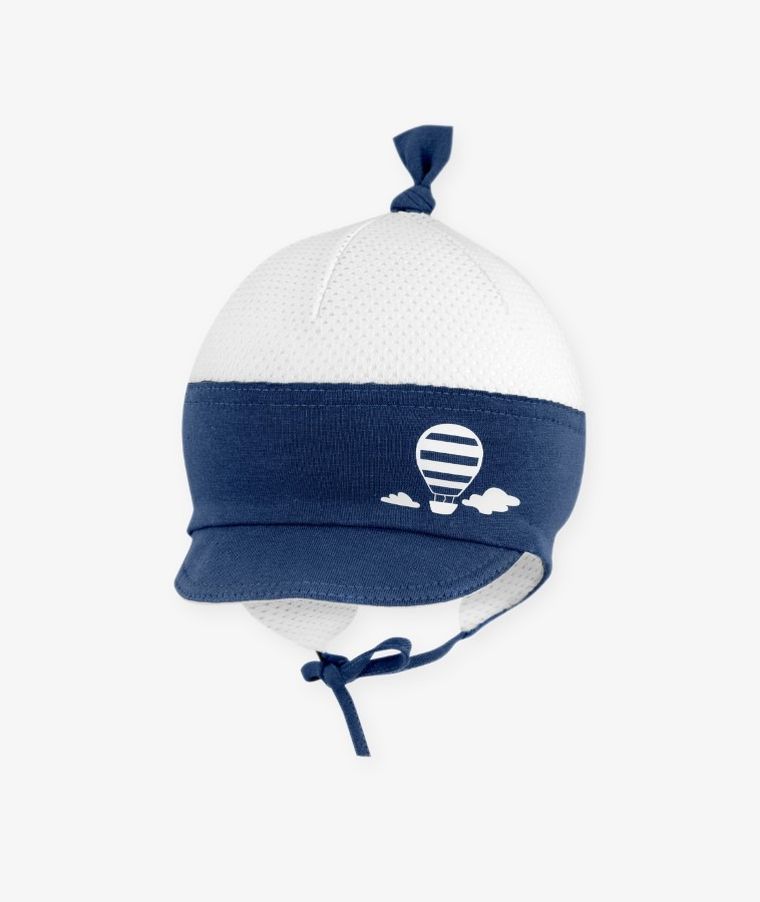 Czapka z daszkiem chłopięca, wiązana, biało-granatowa, Iltom