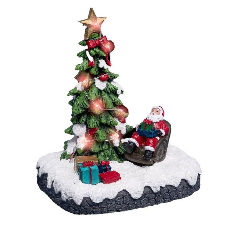 Fééric Lights and Christmas, miasteczko bożonarodzeniowe, scenka świąteczna z Mikołajem pod choinką