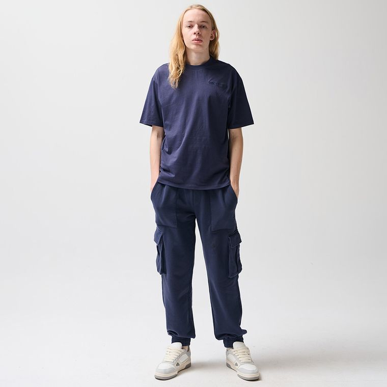 Granatowe spodnie dresowe unisex z kieszeniami cargo NOWEAR