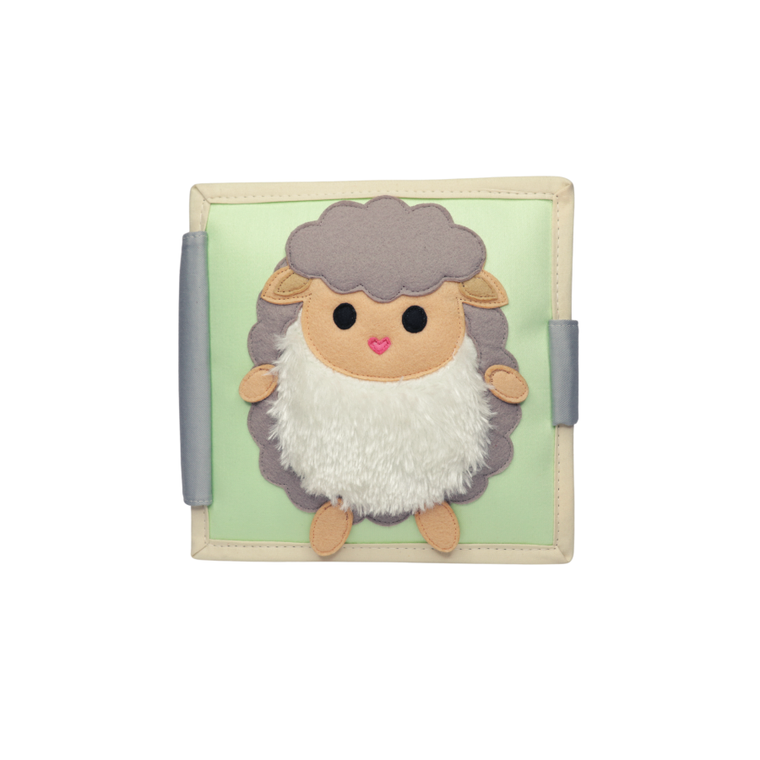 Jolly Designs. Owieczka. Książeczka sensoryczno-manipulacyjna