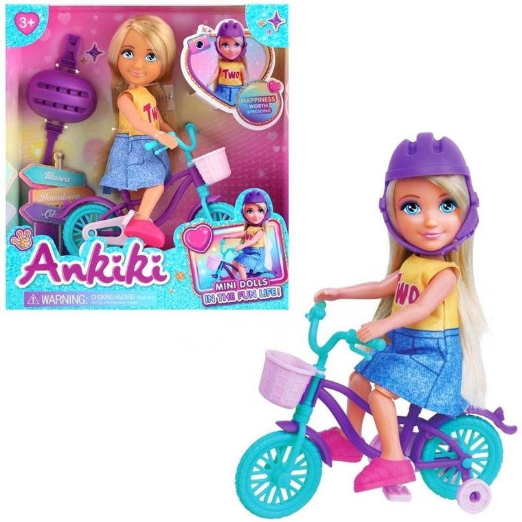 Trifox, lalka dziewczynka z kaskiem, na rowerze