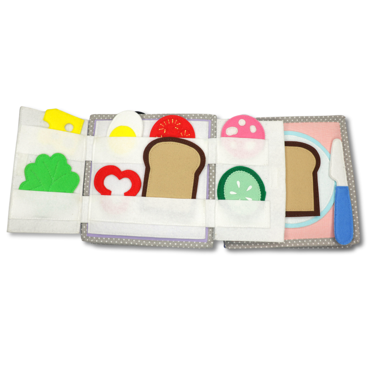 Jolly Designs. Mały Pilot. Książeczka sensoryczno-manipulacyjna