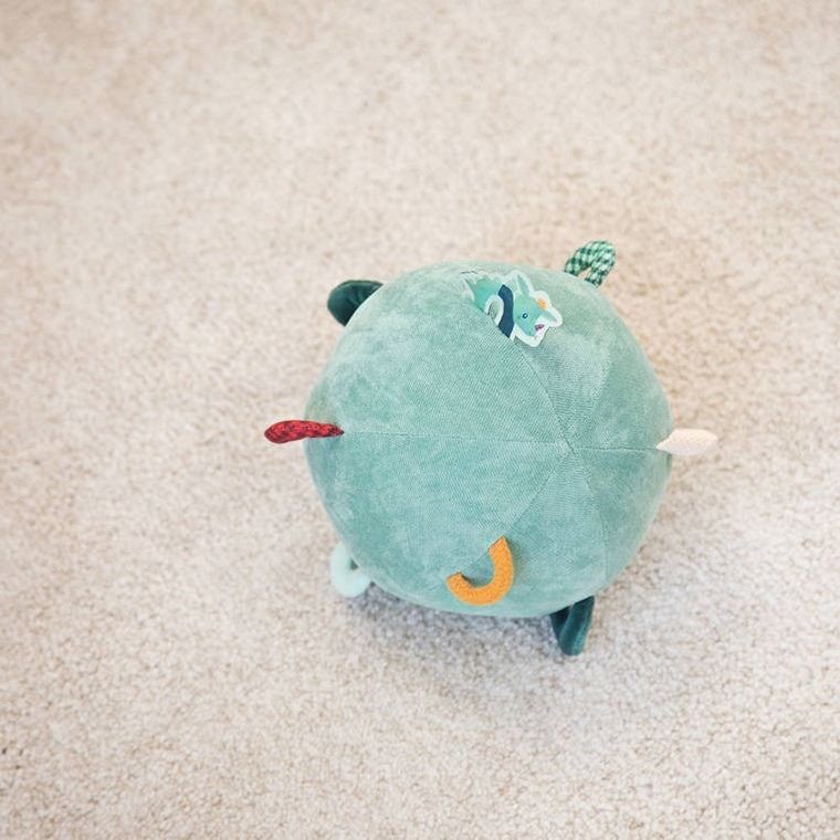 Lilliputiens, Smok Joe, piłeczka sensoryczna z dźwiękiem, 6m+