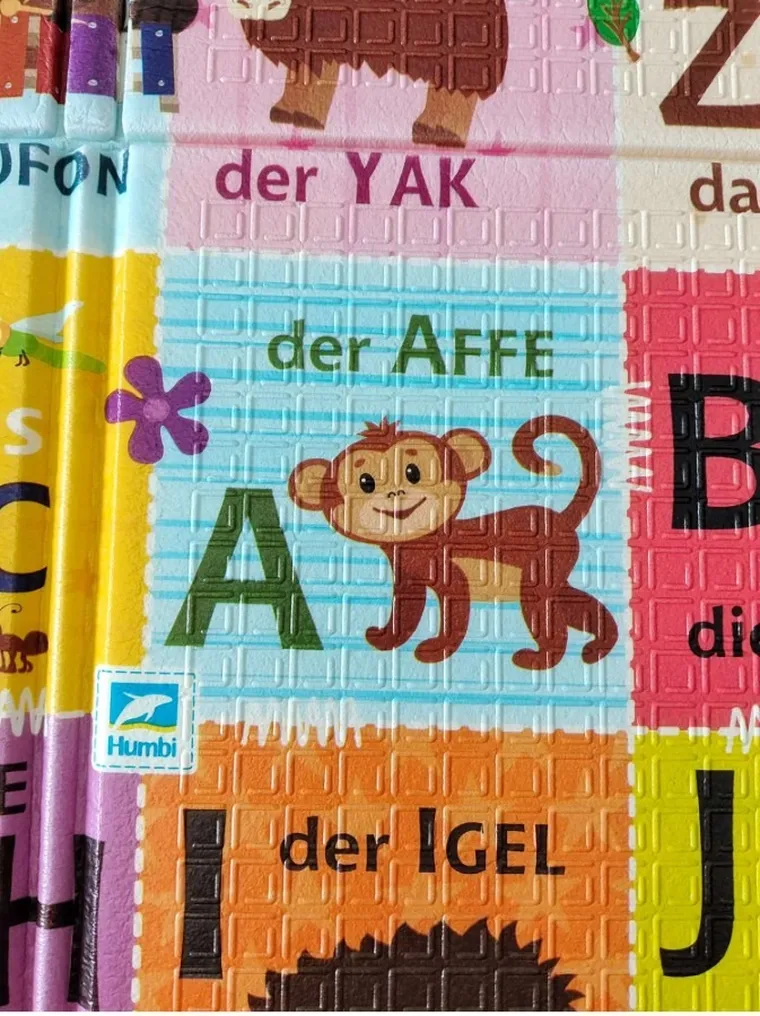 Humbi, mata edukacyjna 2w1 z pianki XPE, alfabet: wersja niemiecka, 120-180 cm