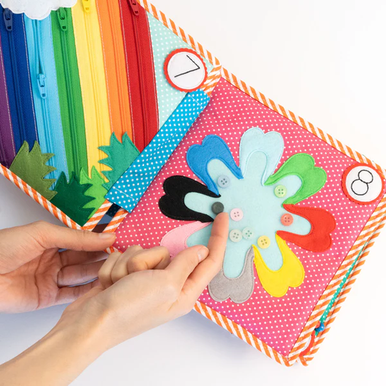 Jolly Designs. 1 2 3. Książeczka sensoryczno-manipulacyjna