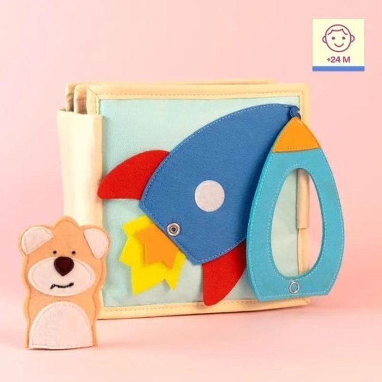 Jolly Designs. Rakieta. Książeczka sensoryczno-manipulacyjna