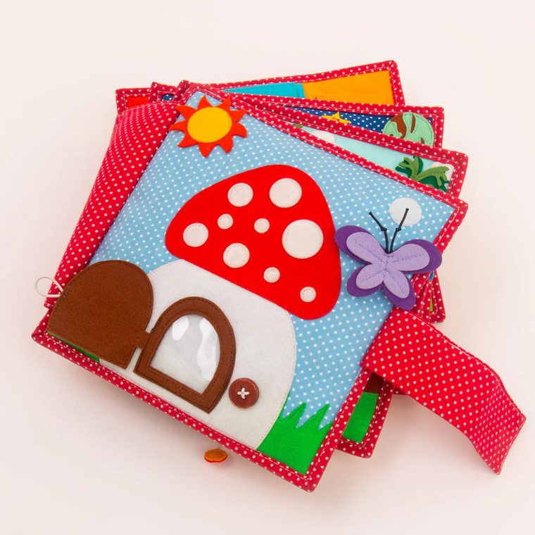 Jolly Designs. Szczęście. Książeczka sensoryczno-manipulacyjna