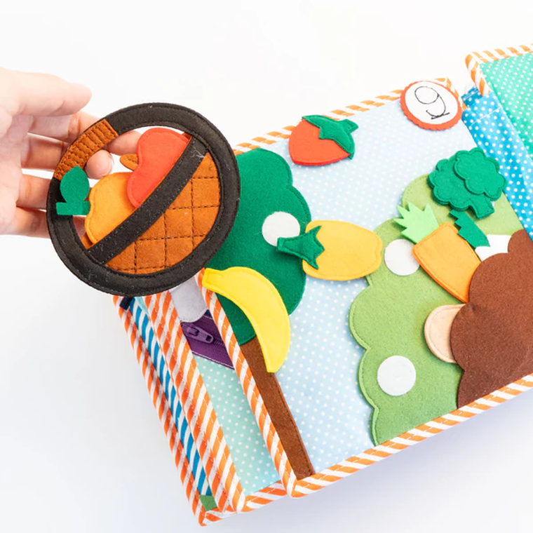 Jolly Designs. 1 2 3. Książeczka sensoryczno-manipulacyjna