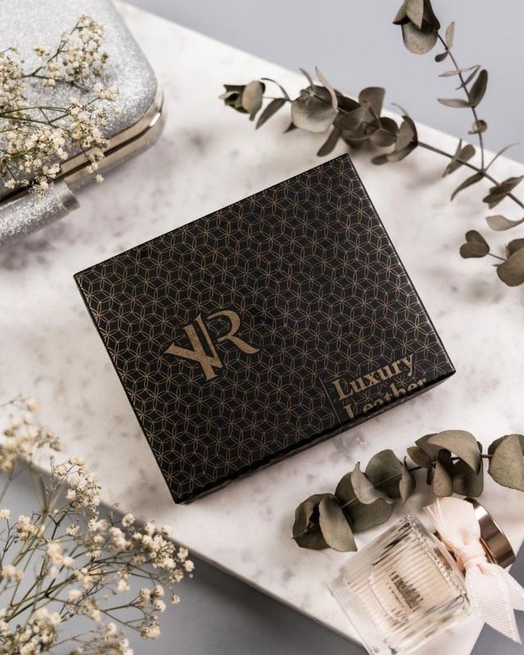 Skórzany portfel damski z ozdobnym zapięciem, Rovicky