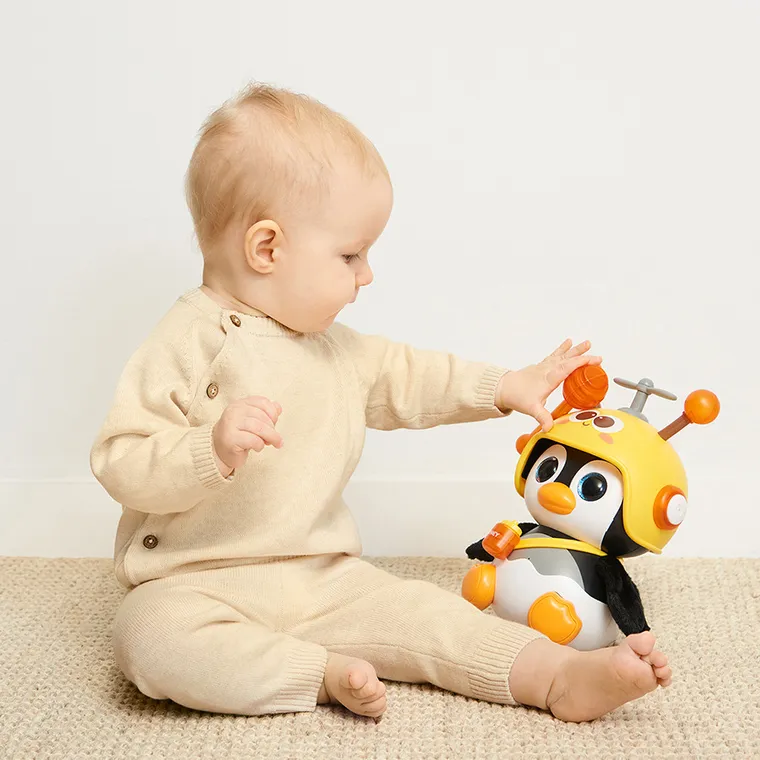 Smiki, Bzyczący Pingwinek, interaktywna zabawka muzyczna