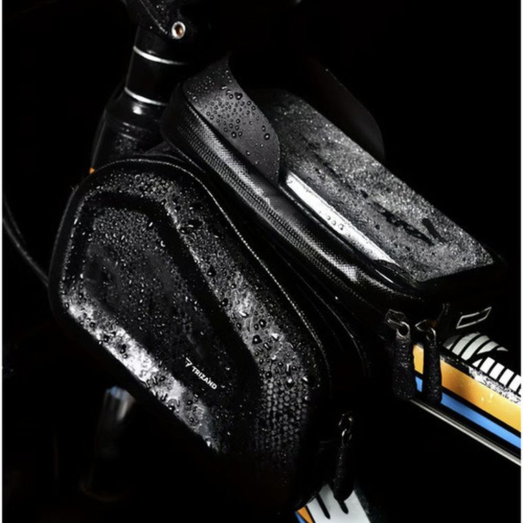 Trizand, sakwa rowerowa z etui na telefon