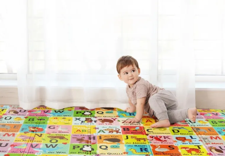 Humbi, mata edukacyjna 2w1 z pianki XPE, alfabet: wersja niemiecka, 120-180 cm