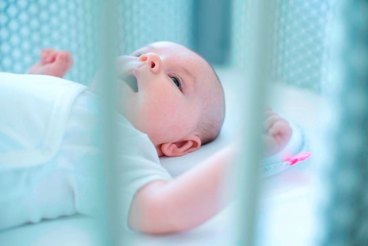 Motherhood, Classics Niebieski, ergonomiczna poduszka stabilizująca dla niemowląt