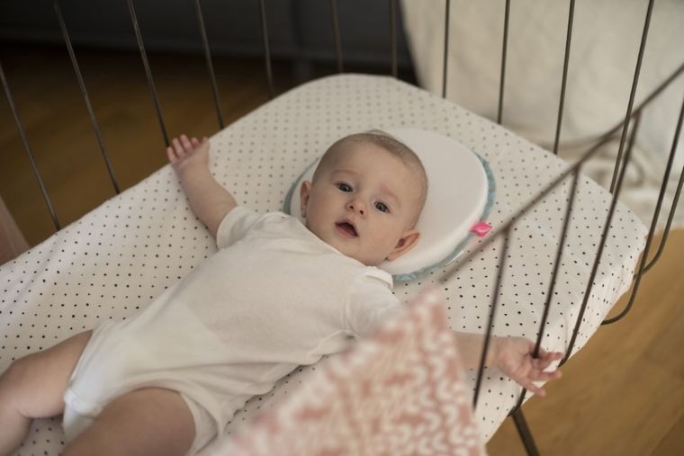 Motherhood, Kropy Różowe, ergonomiczna poduszka stabilizująca dla niemowląt