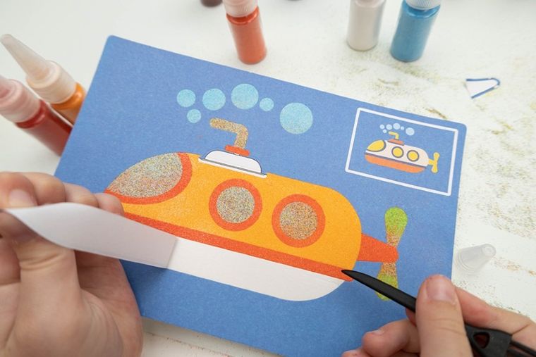 Askato, Genialny dzieciak, piaskowa malowanka pojazdy