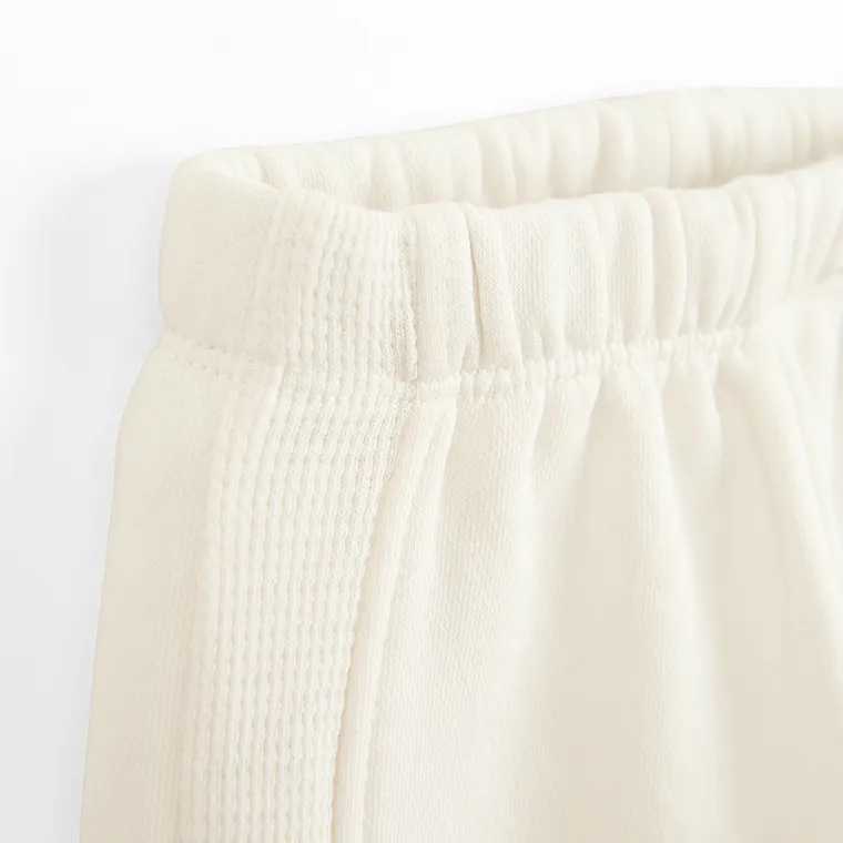 Cool Club, Spodnie dresowe chłopięce, baggy, ocieplane, ecru