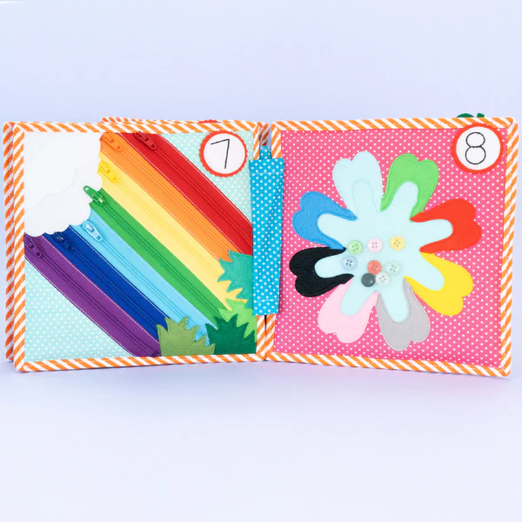 Jolly Designs. 1 2 3. Książeczka sensoryczno-manipulacyjna