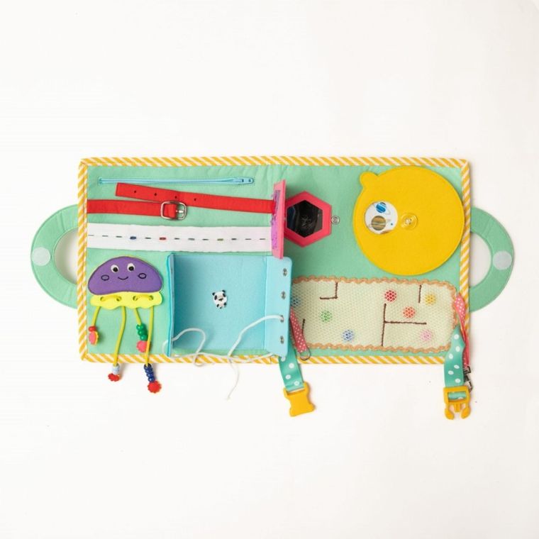 Jolly Designs. Kosmos. Tablica manipulacyjna. Książeczka sensoryczna