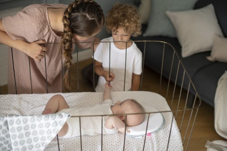 Motherhood, Classics Niebieski, ergonomiczna poduszka stabilizująca dla niemowląt