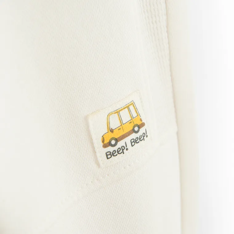 Cool Club, Spodnie dresowe chłopięce, baggy, ocieplane, ecru