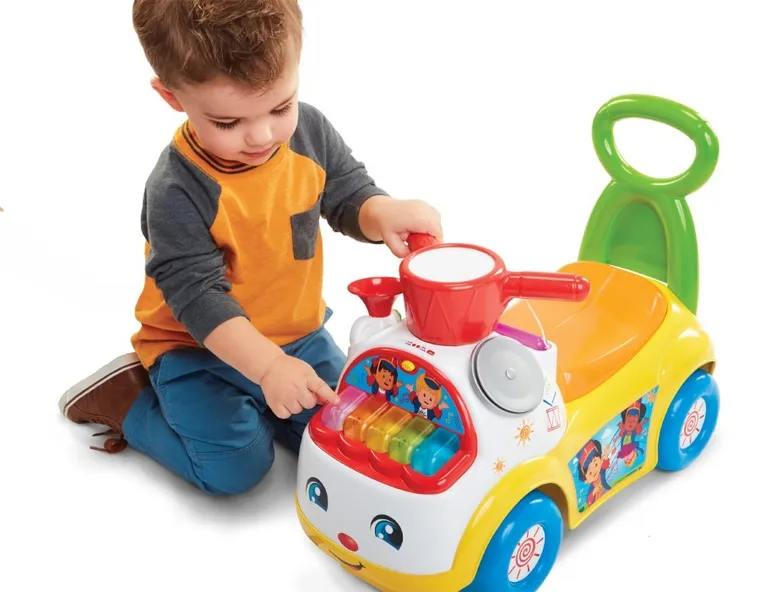 Fisher-Price, Muzyczna Parada, jeździk, żółty