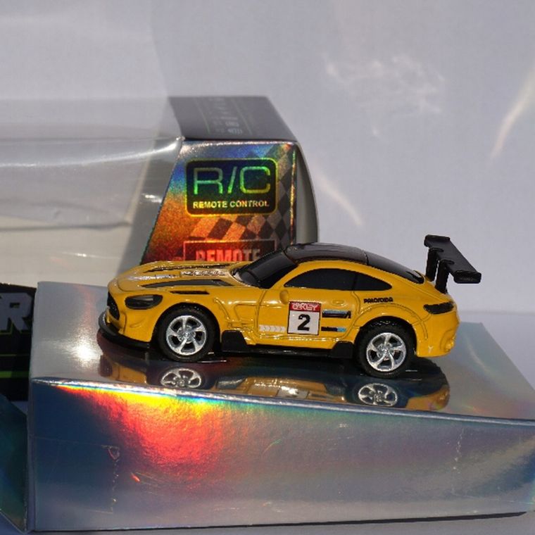 QBI, mini pojazd zdalnie sterowany, 1:64, żółty