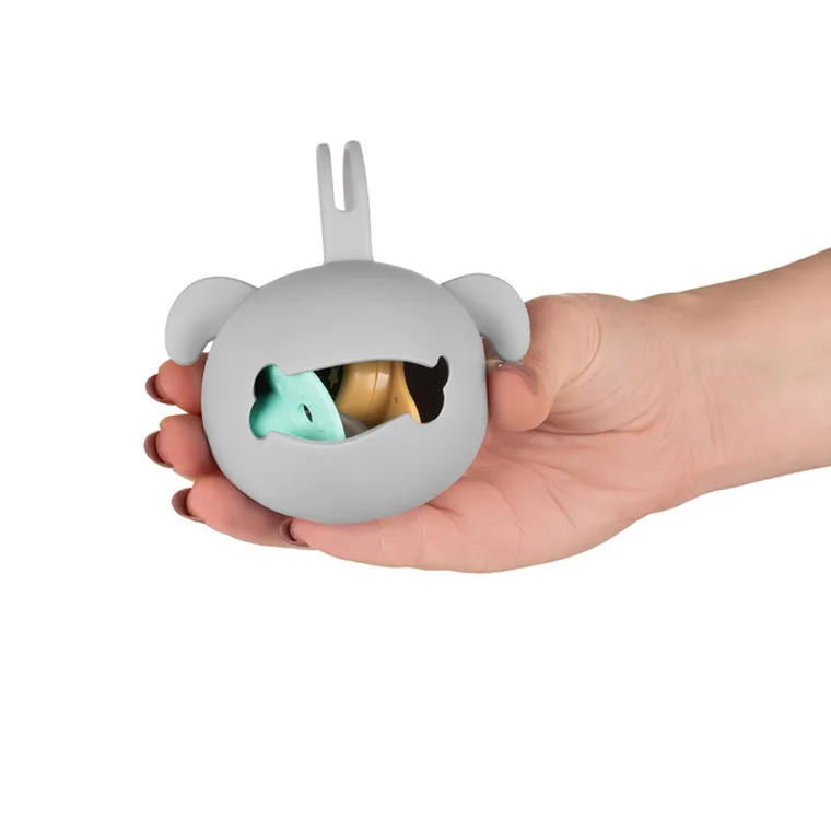 Akuku, silikonowy pojemnik na smoczek, piesek