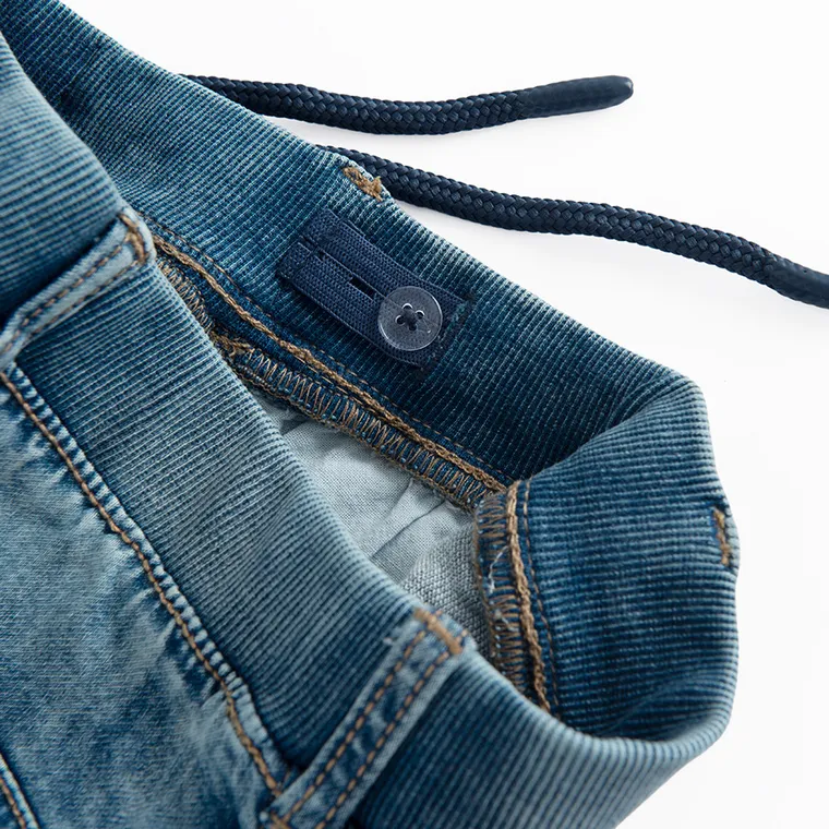 Jeansowe spodnie o kroju jogger z regulacją Cool Club