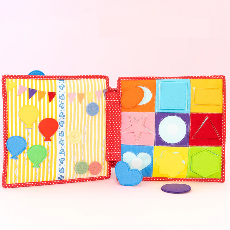 Jolly Designs. Szczęście. Książeczka sensoryczno-manipulacyjna