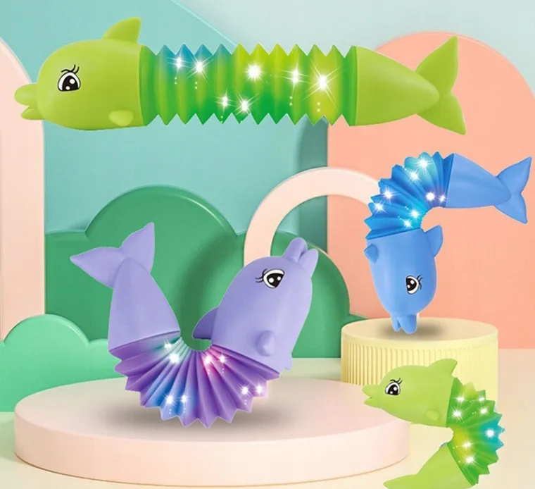 Maksik, Pop Tube, delfin, świecący gniotek, 1 szt.