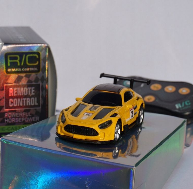 QBI, mini pojazd zdalnie sterowany, 1:64, żółty