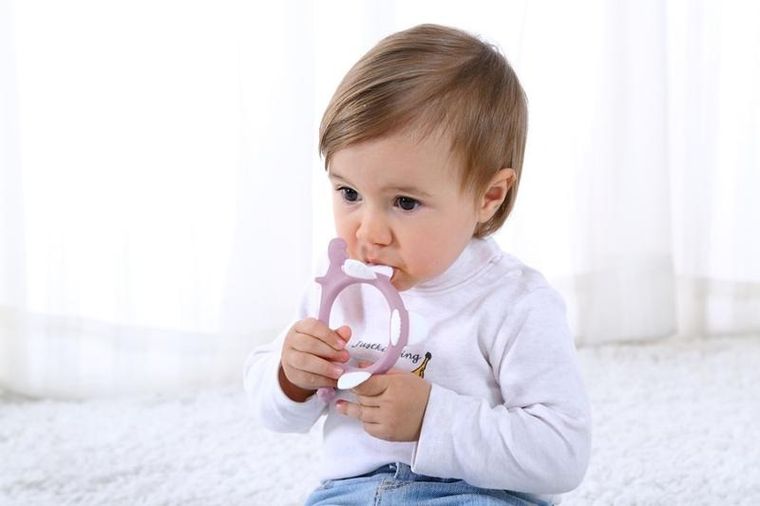 Smily Mia, gryzak silikonowy, dinozaur, Norman, light pink