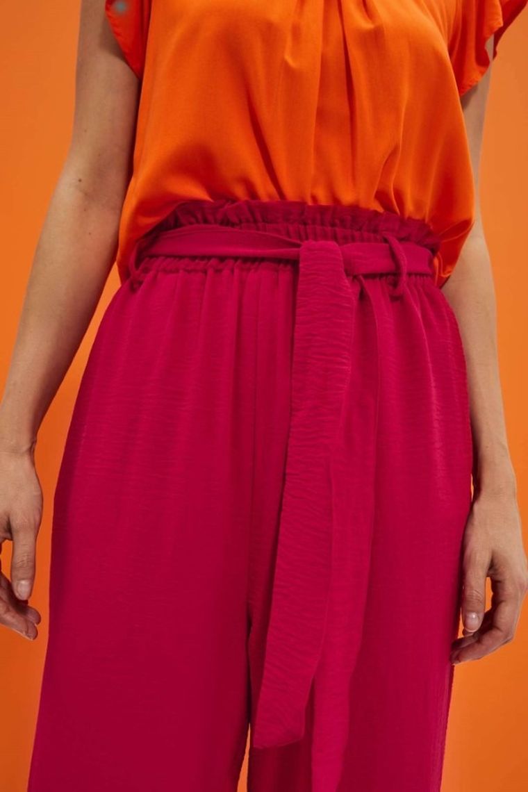 Spodnie materiałowe damskie, różowe, Moodo