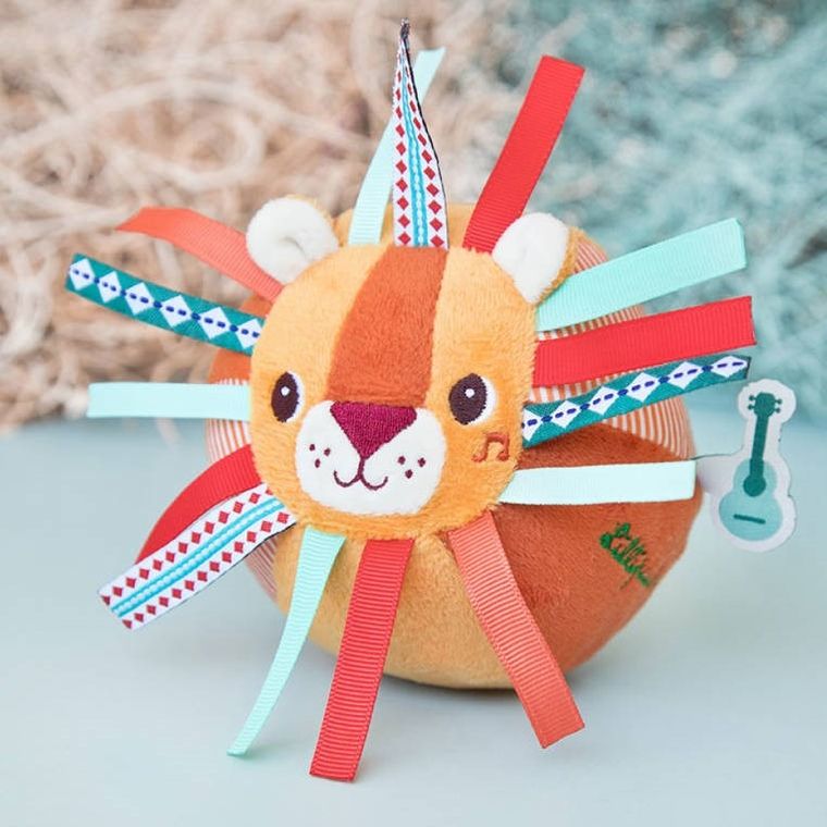 Lilliputiens, Lew Jack, piłeczka sensoryczna z dzwoneczkiem i wypustkami, 6m+