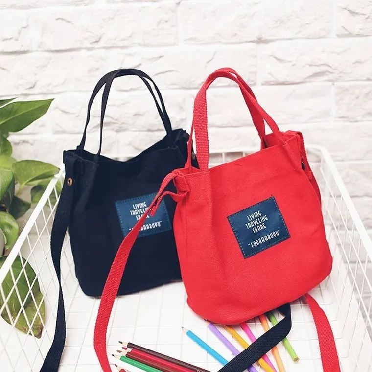 Materiałowa torebka listonoszka, różowa