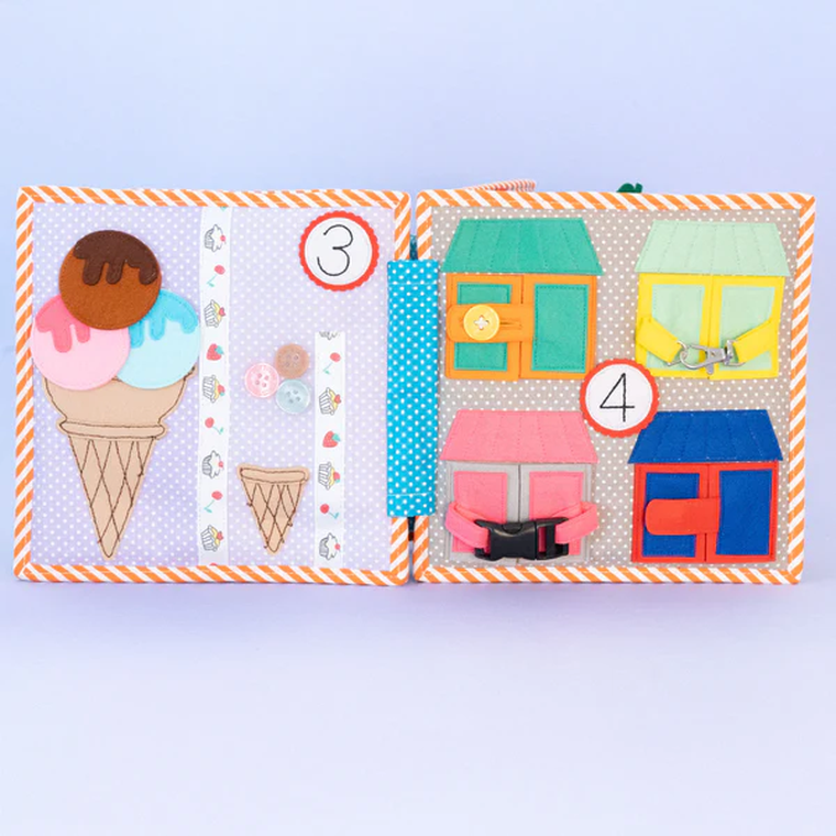 Jolly Designs. 1 2 3. Książeczka sensoryczno-manipulacyjna