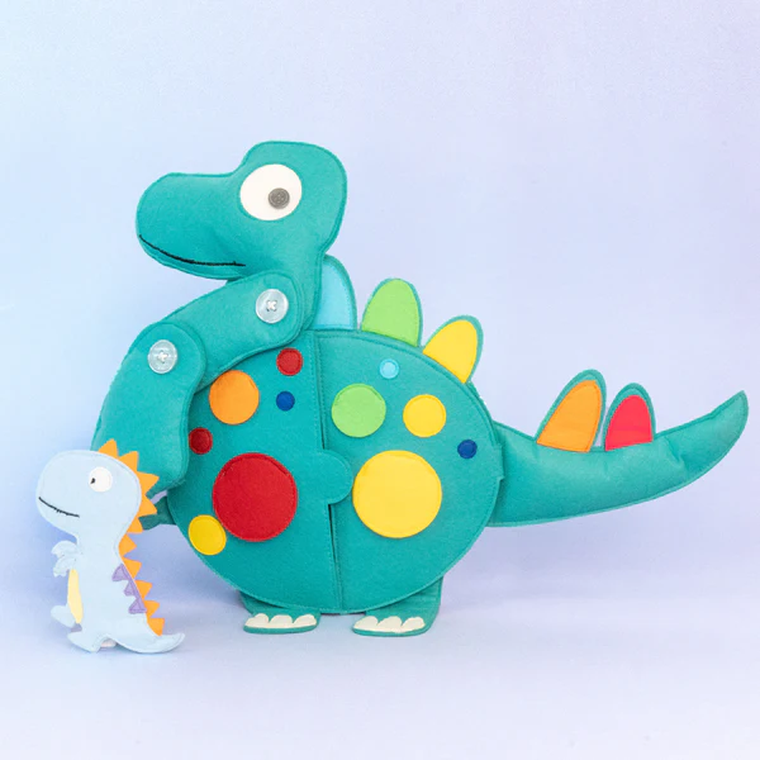 Jolly Designs. Dinozaur. Podróżna książeczka sensoryczno-manipulacyjna