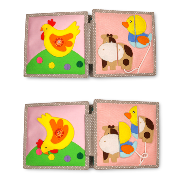 Jolly Designs. Lew. Książeczka sensoryczno-manipulacyjna