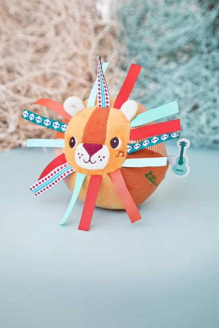 Lilliputiens, Lew Jack, piłeczka sensoryczna z dzwoneczkiem i wypustkami, 6m+