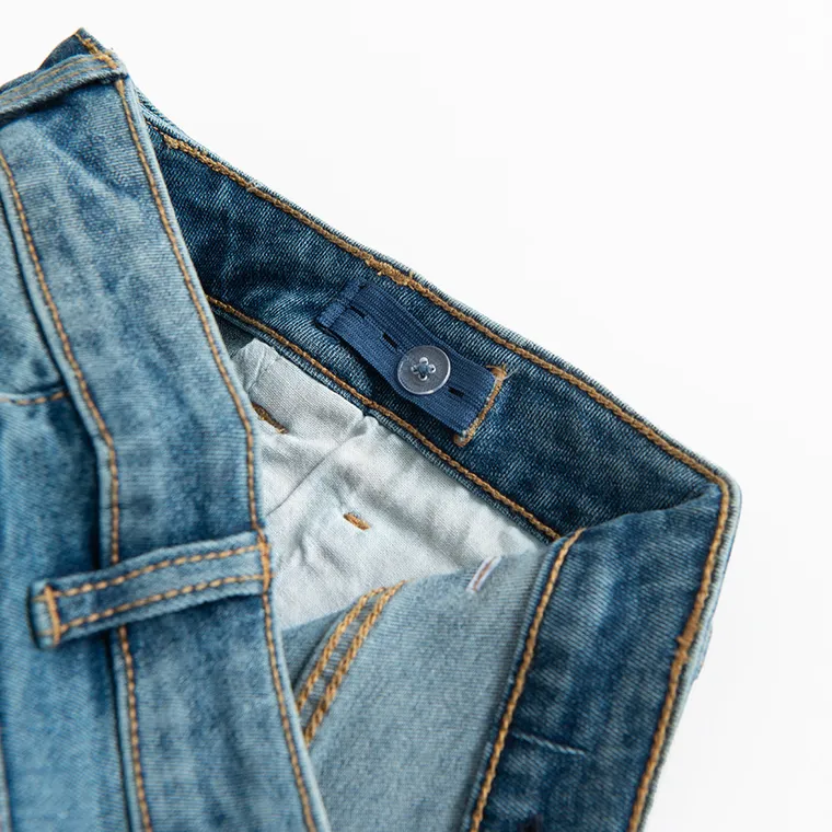 Regulowane spodnie jeansowe flare z przetarciami Cool Club