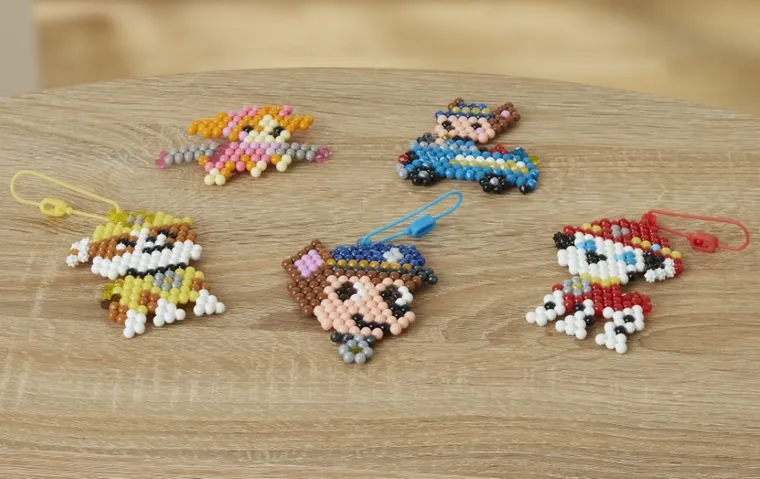 Aquabeads, Psi Patrol, koraliki wodne, zestaw startowy, 700 elementów, 35126