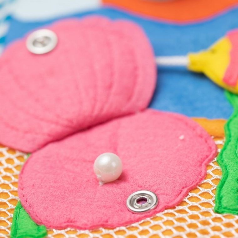 Jolly Designs. Magiczna Ryba. Tablica manipulacyjna. Książeczka sensoryczna