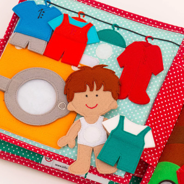 Jolly Designs. Szczęście. Książeczka sensoryczno-manipulacyjna