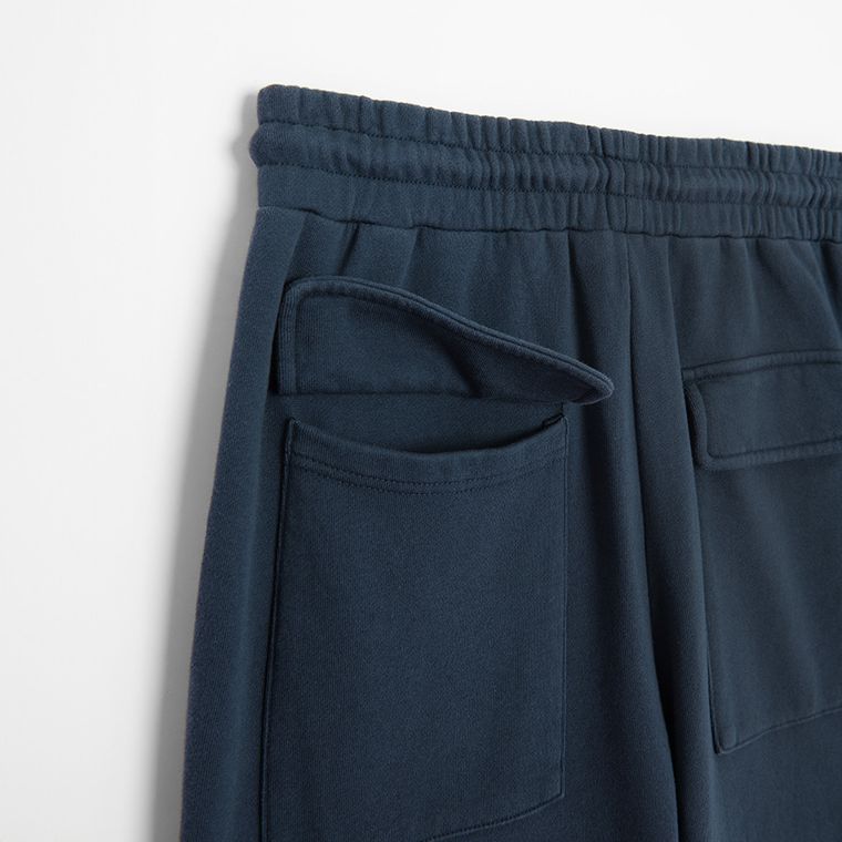 Granatowe spodnie dresowe unisex z kieszeniami cargo NOWEAR