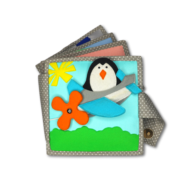 Jolly Designs. Mały Pilot. Książeczka sensoryczno-manipulacyjna