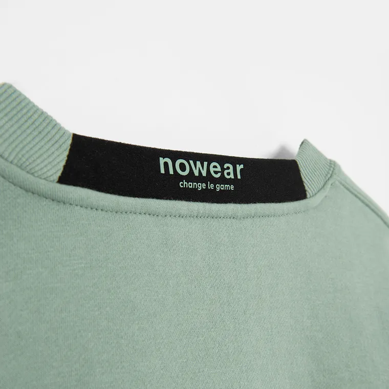 Miętowa bluza o kroju cropp NOWEAR