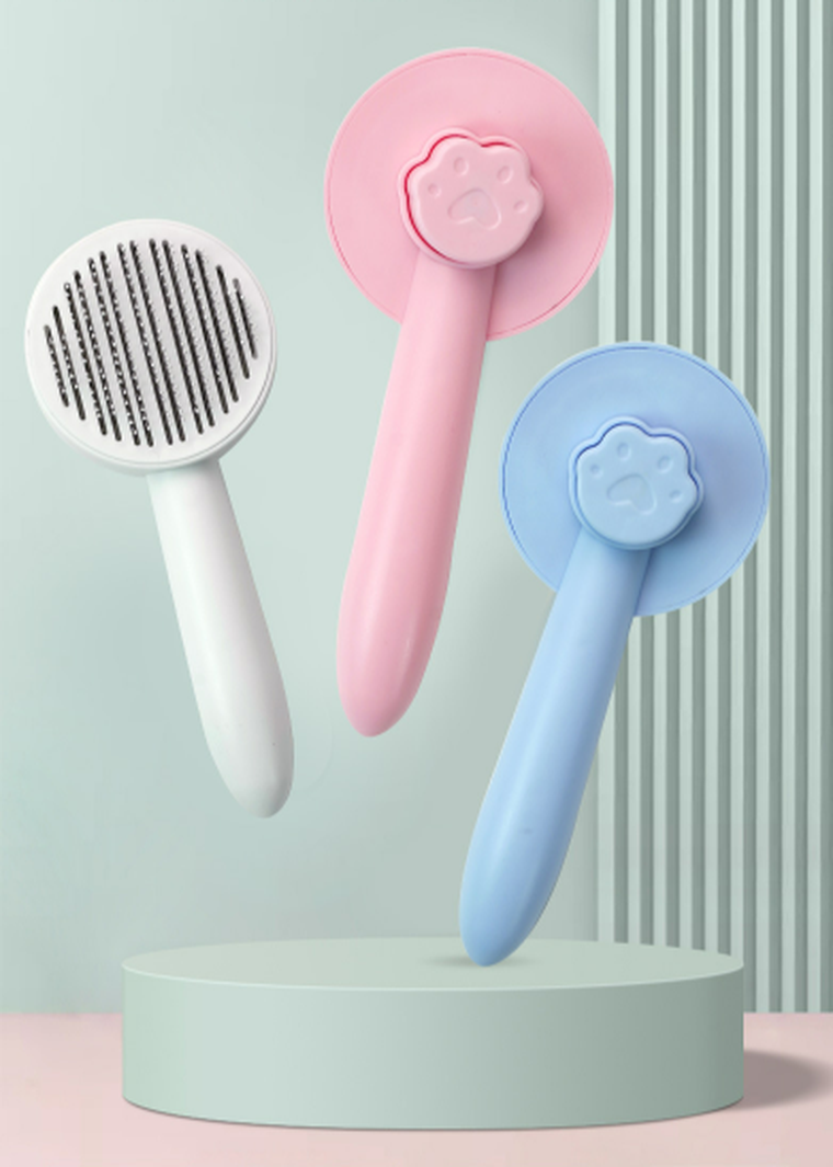 Szczotka do usuwania sierści psa lub kota, różowa