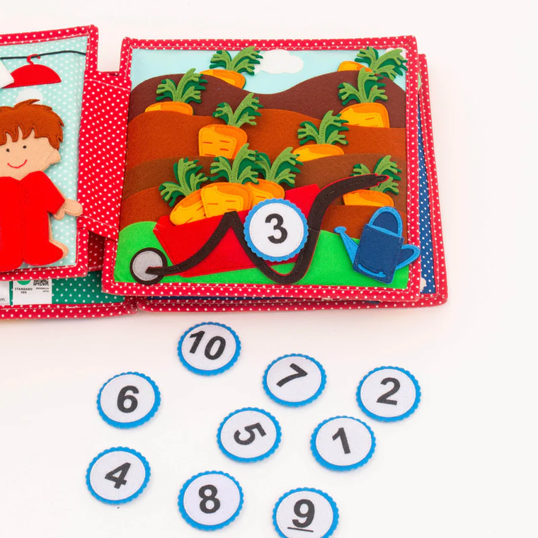 Jolly Designs. Szczęście. Książeczka sensoryczno-manipulacyjna