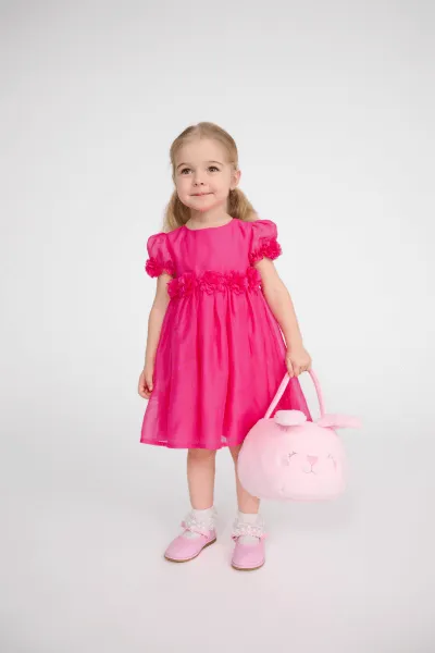 Rozkloszowana różowa sukienka